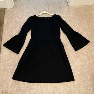 Classic black dress with bell sleeves